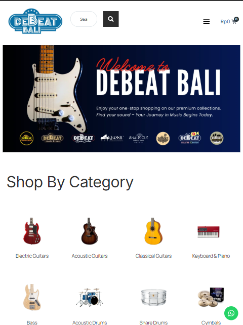 DeBeat Bali website: music store category page showing electric guitars, acoustic guitars, keyboards, drums and cymbals